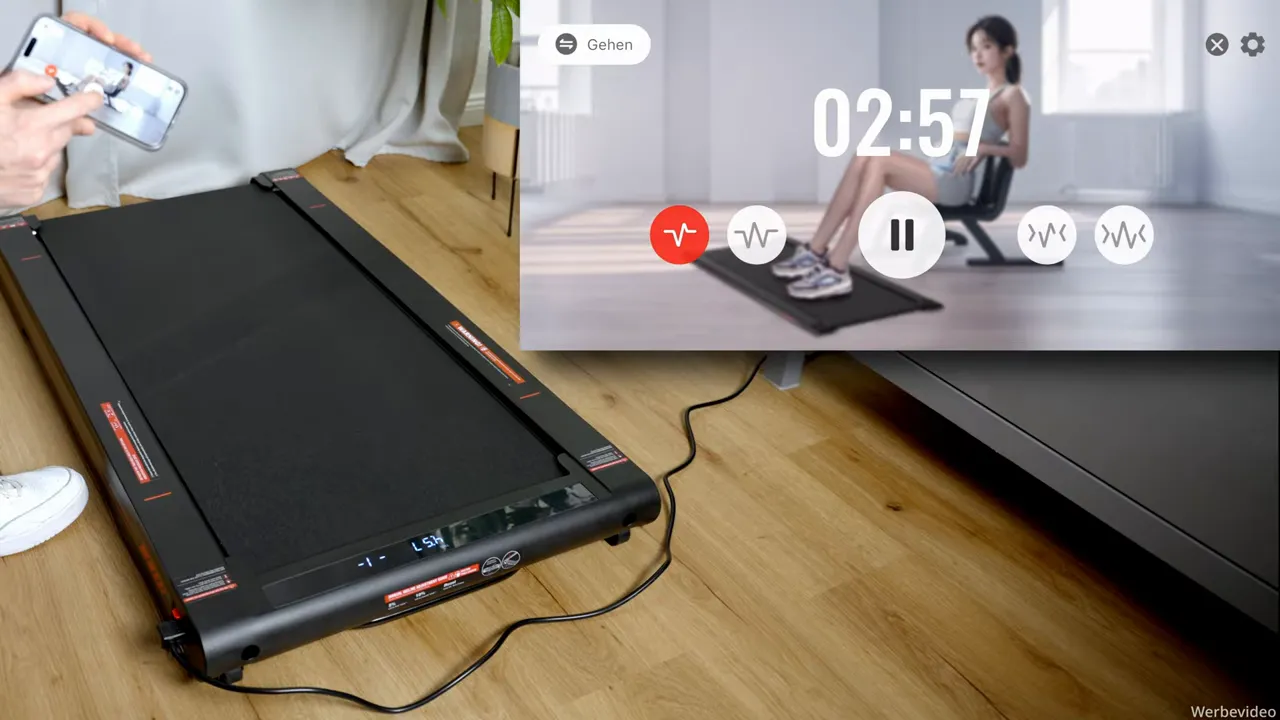 Smartphone in der Hand, App zeigt laufende Session (02:57) mit Pause-Button über dem Sperax P2 Pro