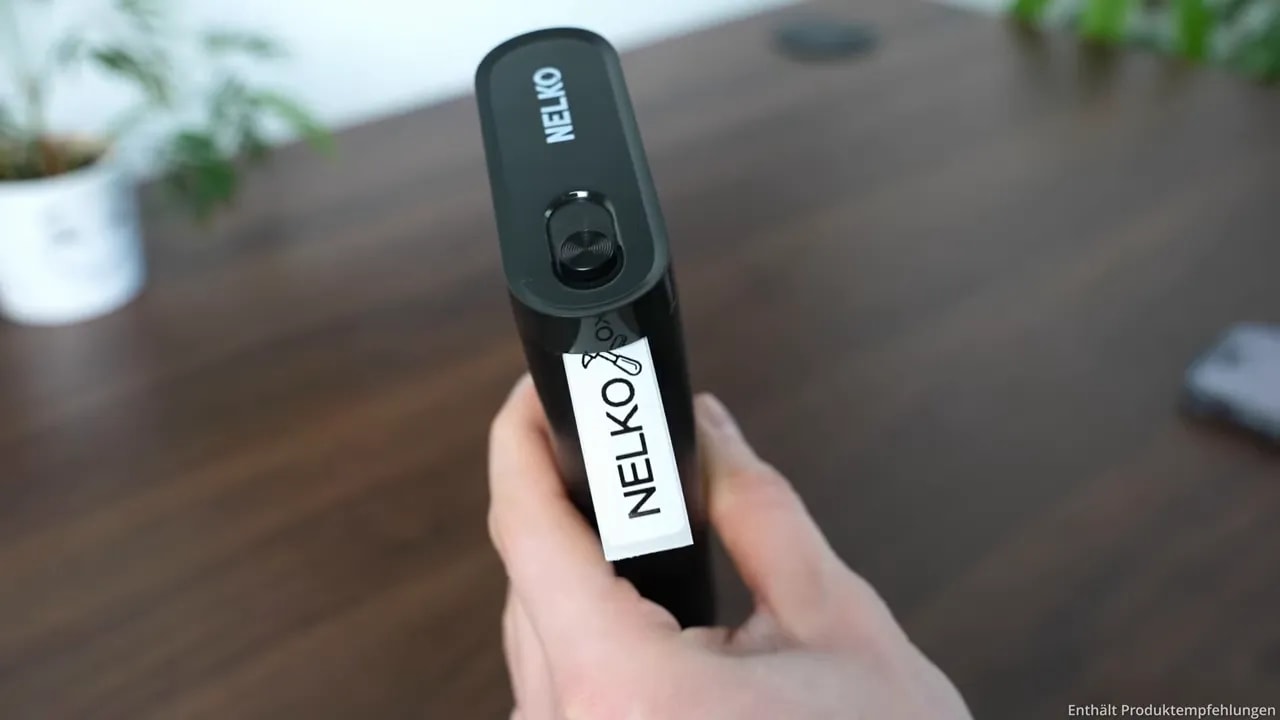 NELKO P21 printing a white label with black NELKO lettering